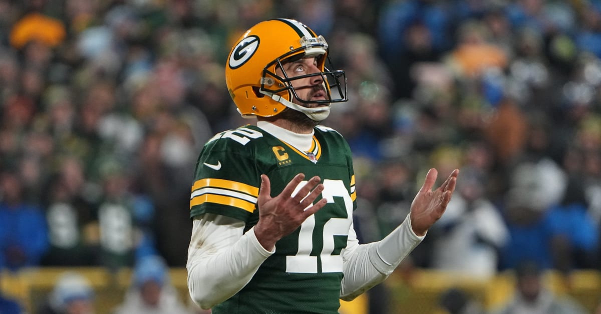 GREEN BAY, WI - OCTOBER 16: Green Bay Packers quarterback Aaron Rodgers  (12) passes during a game between the Green Bay Packers and the New York  Jets at Lambeau Field on October