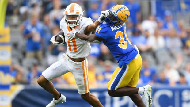 Pittsburgh defensive back Erick Hallett (31) attempts to tackle Tennessee wide receiver Jalin Hyatt (11) during the second half of a game between the Tennessee Volunteers and Pittsburgh Panthers in Acrisure Stadium in Pittsburgh, Saturday, Sept. 10, 2022. Tennessee defeated Pitt 34-27 in overtime.