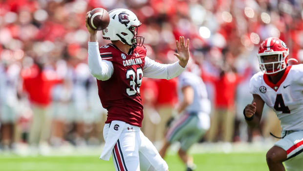 Sep 17, 2022; Columbia, South Carolina, USA; South Carolina Gamecocks punter Kai Kroeger (39) passes for a first down on a fake punt against the Georgia Bulldogs in the second quarter at Williams-Brice Stadium.