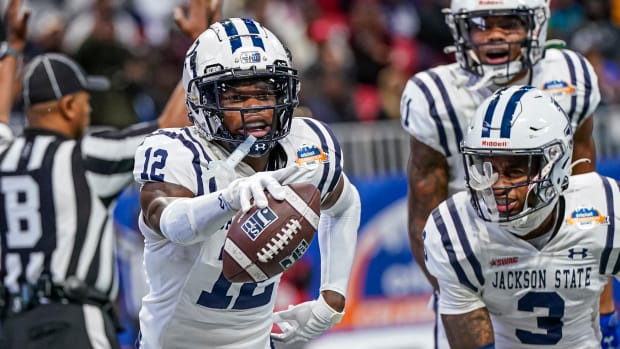 Dec 17, 2022; Atlanta, GA, USA; Jackson State Tigers wide receiver Travis Hunter (12) reacts after catching a touchdown against the North Carolina Central Eagles during the second half during the Celebration Bowl at Mercedes-Benz Stadium.
