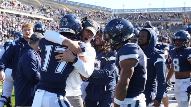 Oct 29, 2022; East Hartford, Connecticut, USA; Connecticut Huskies tight end Justin Joly (17) is congratulated after scoring against the Boston College Eagles in the first quarter at Rentschler Field at Pratt & Whitney Stadium.