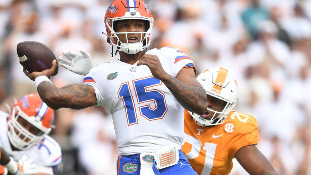 Florida quarterback Anthony Richardson (15) pulls back to throw as Tennessee defensive lineman Omari Thomas (21) approaches during the NCAA college football game on Saturday, September 24, 2022 in Knoxville, Tenn.