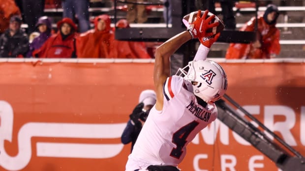 Nov 5, 2022; Salt Lake City, Utah, USA; Arizona Wildcats wide receiver Tetairoa McMillan (4) catches a ball to score a two point conversion against the Utah Utes in the fourth quarter at Rice-Eccles Stadium