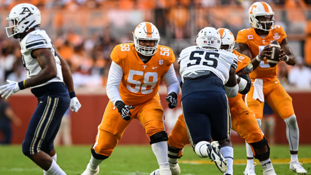Sep 17, 2022; Knoxville, Tennessee, USA; Tennessee Volunteers offensive lineman Darnell Wright (58) blocks Akron Zips defensive lineman Kyle Thomas (55) during the first half at Neyland Stadium.