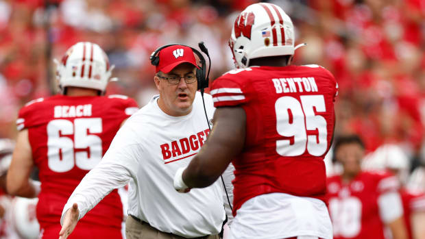 Sep 17, 2022; Madison, Wisconsin, USA; Wisconsin Badgers head coach Paul Chryst celebrates following a touchdown during the first quarter against the New Mexico State Aggies at Camp Randall Stadium.