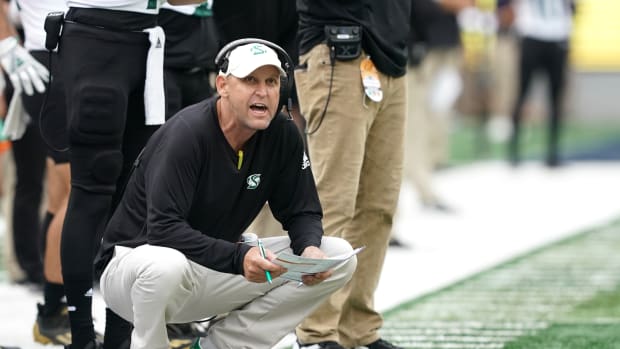 Sep 18, 2021; Berkeley, California, USA; Sacramento State Hornets head coach Troy Taylor kneels on the sideline during the second quarter against the California Golden Bears at FTX Field at California Memorial Stadium.