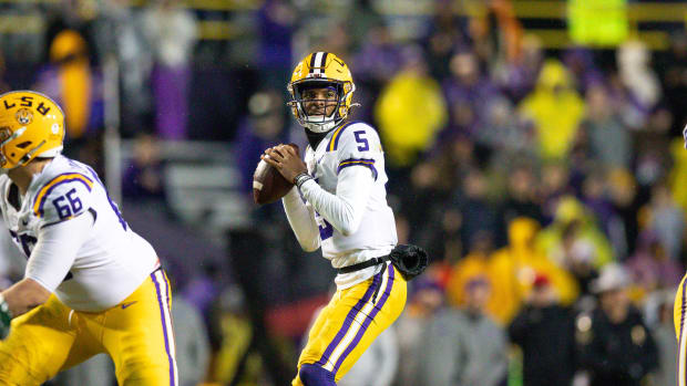 Nov 19, 2022; Baton Rouge, Louisiana, USA; LSU Tigers quarterback Jayden Daniels (5) looks to pass the ball against the UAB Blazers during the second half at Tiger Stadium.