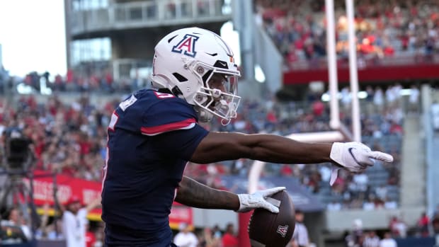 Oct 29, 2022; Tucson, Arizona, USA; Arizona Wildcats wide receiver Dorian Singer (5) reacts after being ruled out of bounds against the USC Trojans during the first half at Arizona Stadium.