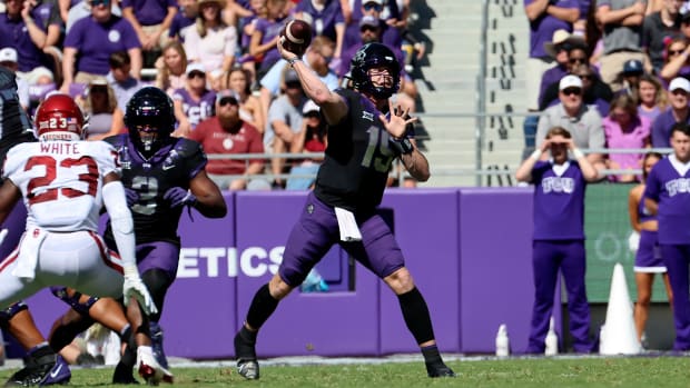 Oct 1, 2022; Fort Worth, Texas, USA; TCU Horned Frogs quarterback Max Duggan (15) throws during the first half against the Oklahoma Sooners at Amon G. Carter Stadium.