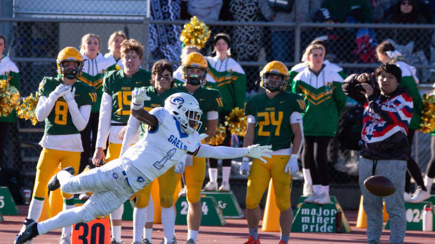 Bishop Gorman's Zachariah Branch misses the catch at the state championship game against Bishop Manogue at Carson High School on Nov. 19, 2022.