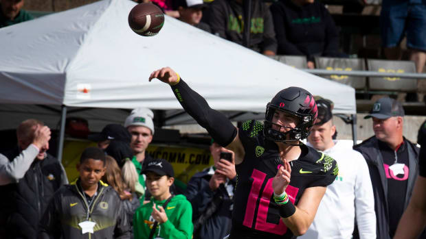 Oregon quarterback Bo Nix throws out a pass during warmups as the Oregon Ducks take on the UCLA Bruins Saturday, Oct. 22, 2022, at Autzen Stadium in Eugene, Ore.