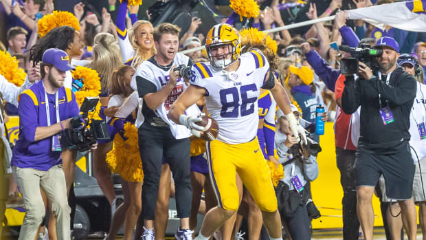 LSU tight end Mason Taylor celebrates after scoring the game-winning two point conversion in overtime against Alabama at Tiger Stadium