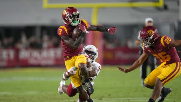 Sep 17, 2022; Los Angeles, California, USA; Southern California Trojans wide receiver Jordan Addison (3) carries the ball against the Fresno State Bulldogs in the second half at United Airlines Field at Los Angeles Memorial Coliseum.