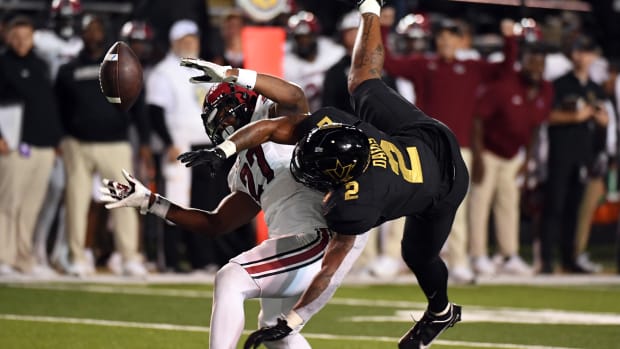 Nov 5, 2022; Nashville, Tennessee, USA; Vanderbilt Commodores running back Ray Davis (2) has a pass broken up by South Carolina Gamecocks defensive back DQ Smith (27) during the first half at FirstBank Stadium.