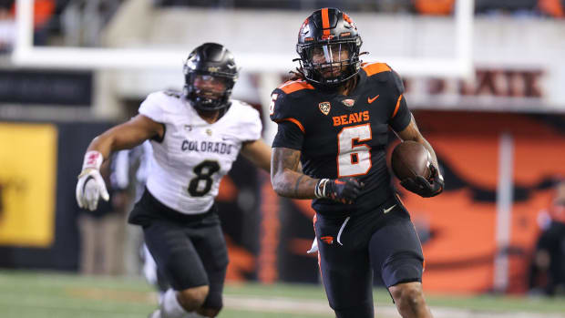 Oregon State running back Damien Martinez (6) carries the ball during the fourth quarter against Colorado at Reser Stadium in Corvallis, Ore. on Saturday, Oct. 22, 2022.