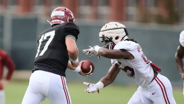 Quarterback Paul Tyson (17) hands off to running back Camar Wheaton (25) during practice for the Crimson Tide Thursday, Aug. 12, 2021.[Staff Photo/Gary Cosby Jr.] Alabama Practice August 12