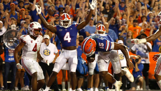 Sep 3, 2022; Gainesville, Florida, USA; Florida Gators quarterback Anthony Richardson (15) scores a touchdown against the Utah Utes during the second half at Steve Spurrier-Florida Field. Mandatory Credit: Kim Klement-USA TODAY Sports