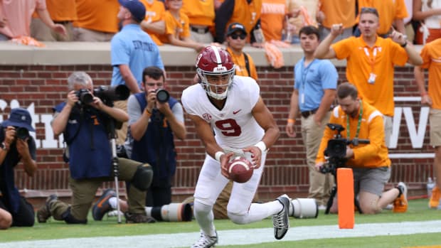 Oct 15, 2022; Knoxville, Tennessee, USA; Alabama Crimson Tide quarterback Bryce Young (9) has trouble with the snap during the first quarter against the Tennessee Volunteers at Neyland Stadium.