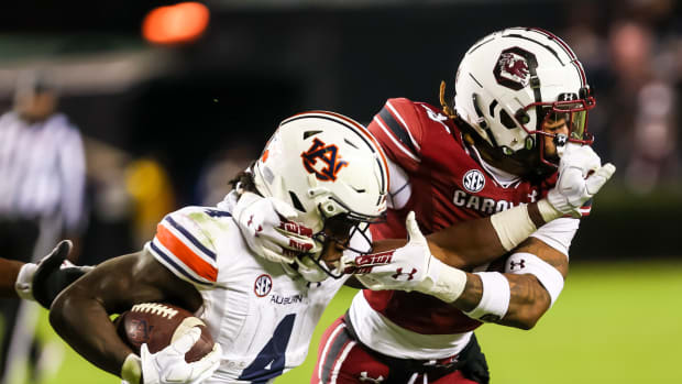Nov 20, 2021; Columbia, South Carolina, USA; Auburn Tigers running back Tank Bigsby (4) is brought down by South Carolina Gamecocks defensive back R.J. Roderick (10) in the third quarter at Williams-Brice Stadium.