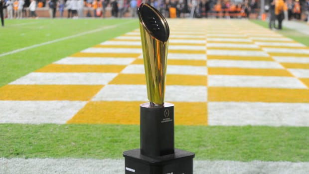 The College Football Playoff National Championship Trophy makes an appearance at the NCAA college football game between Tennessee and Kentucky on Saturday, October 29, 2022 in Knoxville, Tenn.