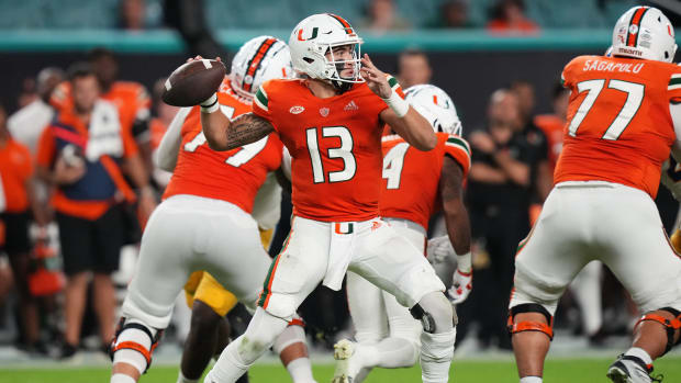 Nov 26, 2022; Miami Gardens, Florida, USA; Miami Hurricanes quarterback Jake Garcia (13) attempts a pass against the Pittsburgh Panthers during the second half at Hard Rock Stadium.