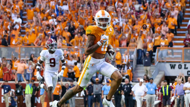 Oct 15, 2022; Knoxville, Tennessee, USA; Tennessee Volunteers wide receiver Jalin Hyatt (11) runs for a touchdown against the Alabama Crimson Tide during the second half at Neyland Stadium.