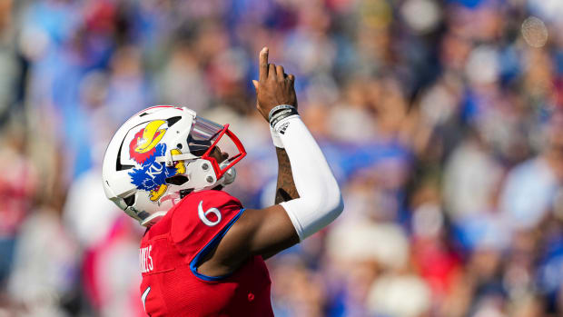 Oct 8, 2022; Lawrence, Kansas, USA; Kansas Jayhawks quarterback Jalon Daniels (6) gets ready before the snap against the TCU Horned Frogs during the first half at David Booth Kansas Memorial Stadium.