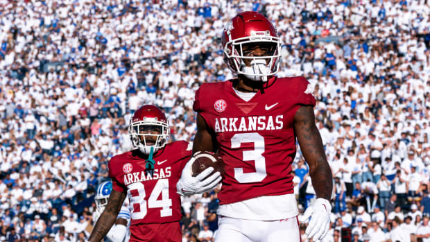 Oct 15, 2022; Provo, Utah, USA; Arkansas Razorbacks wide receiver Matt Landers (3) celebrates towards the crowd alongside wide receiver Warren Thompson (84) after a touchdown in the second half as the Razorbacks face the Brigham Young University Cougars at LaVell Edwards Stadium