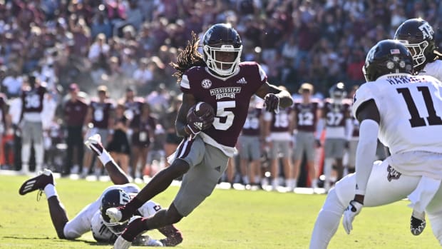 Oct 1, 2022; Starkville, Mississippi, USA; Mississippi State Bulldogs wide receiver Lideatrick Griffin (5) runs the ball while defended by Texas A&M Aggies defensive back Deuce Harmon (11) during the second quarter at Davis Wade Stadium at Scott Field.