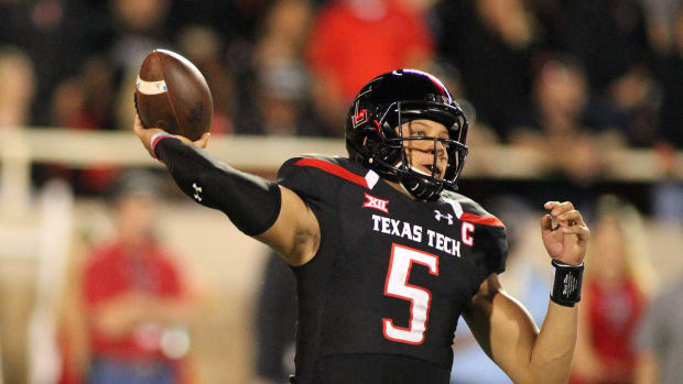 Oct 22, 2016; Lubbock, TX, USA; Texas Tech Red Raiders quarterback Patrick Mahoms (5) passes against the Oklahoma Sooners in the first half at Jones AT&T Stadium.
