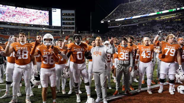 Nov 12, 2022; Austin, Texas, USA; Texas Longhorns head coach Steve Sarkisian and players stand with fans for The Eyes of Texas after a loss against the Texas Christian Horned Frogs at Darrell K Royal-Texas Memorial Stadium.