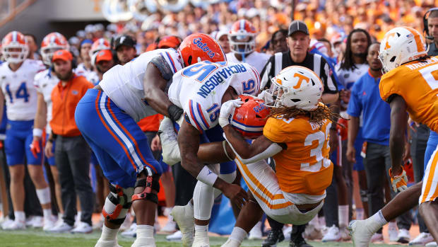 Sep 24, 2022; Knoxville, Tennessee, USA; Florida Gators quarterback Anthony Richardson (15) is tackled by Tennessee Volunteers linebacker Jeremy Banks (33) during the second half at Neyland Stadium.
