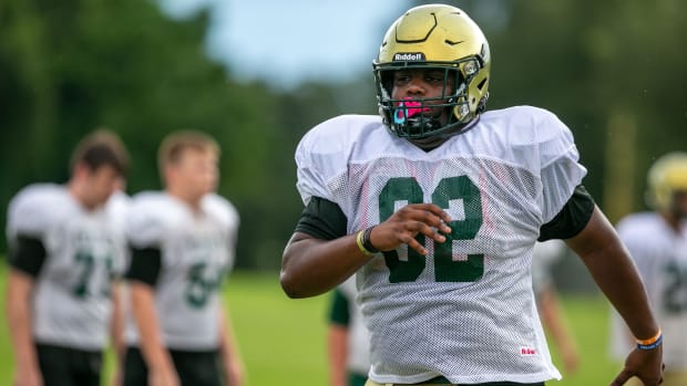 #62 Tommy Kinsler works on a drill during practice at Trinity Catholic High School in Ocala, Florida on Tuesday August 13, 2021. high school football starts later this month.