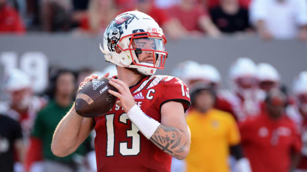Sep 25, 2021; Raleigh, North Carolina, USA; North Carolina State Wolfpack quarterback Devin Leary (13) looks to pass during the first half at Carter-Finley Stadium.