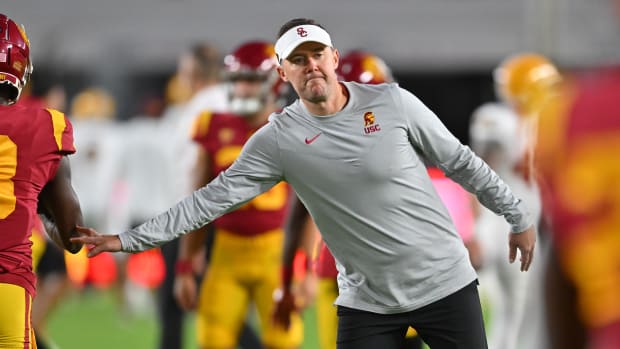 Oct 1, 2022; Los Angeles, California, USA; USC Trojans head coach Lincoln Riley walks on the field before a game against the Arizona State Sun Devils at United Airlines Field at the Los Angeles Memorial Coliseum.