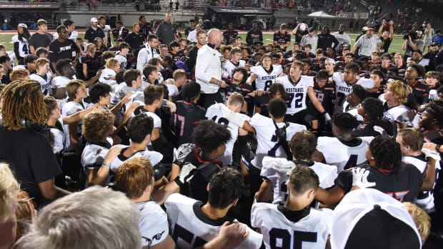 Aug 27, 2022; Alabaster, AL, USA; Lipscomb Academy head coach Trent Dilfer talks to players from both teams after the game at Thompson High School in Alabaster, Ala., Saturday, Aug. 27, 2022. Lipscomb Academy defeated Thompson 24-14.
