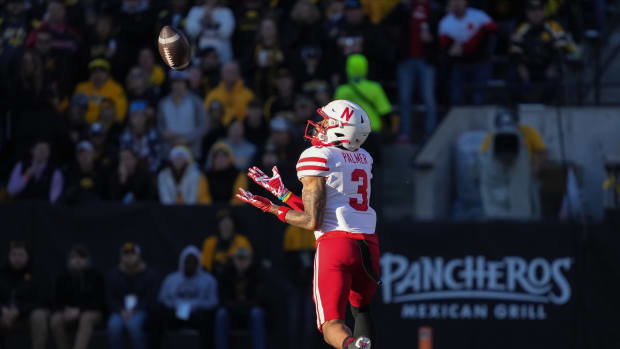 Nebraska wide receiver Trey Palmer (3) pulls down a pass reception for a touchdown in the first quarter against Iowa during a NCAA football game on Friday, Nov. 25, 2022, at Kinnick Stadium in Iowa City.