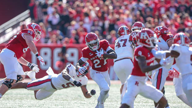 Oct 22, 2022; Piscataway, New Jersey, USA; Rutgers Scarlet Knights running back Samuel Brown V (27) carries the ball asIndiana Hoosiers linebacker Bradley Jennings Jr. (5) pursues during the first half at SHI Stadium.