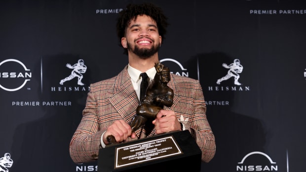 Dec 10, 2022; New York, NY, USA; Southern California quarterback Caleb Williams poses for photos during a press conference in the Astor Ballroom at the New York Marriott Marquis in New York, NY, after winning the 2022 Heisman Trophy.