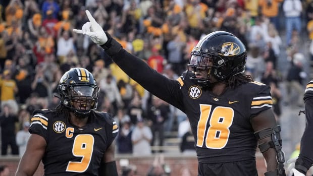 Oct 1, 2022; Columbia, Missouri, USA; Missouri Tigers defensive lineman Trajan Jeffcoat (18) celebrates after a sack against the Georgia Bulldogs during the first half at Faurot Field at Memorial Stadium.