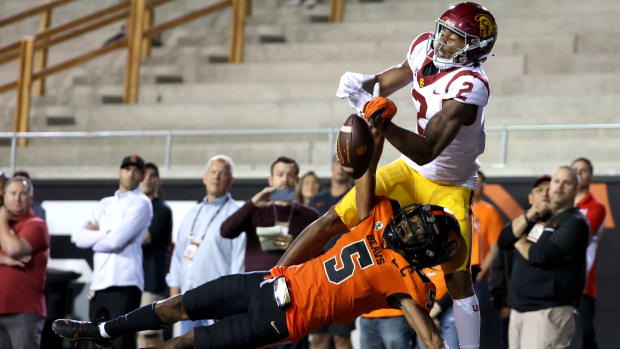 Sep 24, 2022; Corvallis, Oregon, USA; Oregon State Beavers defensive back Alex Austin (5) deflects the ball away from USC Trojans wide receiver Brenden Rice (2) in the second half at Reser Stadium.