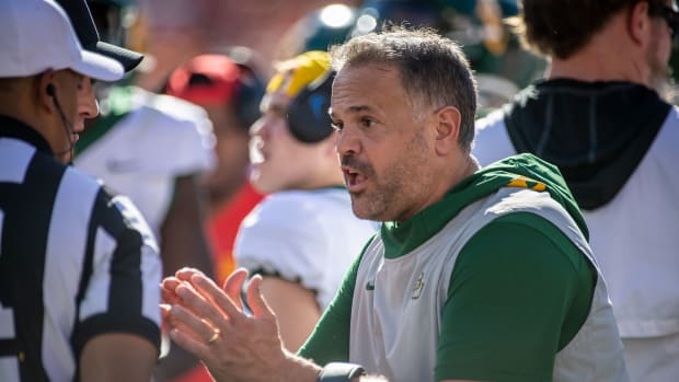 Oct 19, 2019; Stillwater, OK, USA; Baylor Bears head coach Matt Rhule speaks with an official during the game against the Oklahoma State Cowboys at Boone Pickens Stadium.