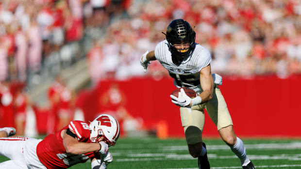 Oct 22, 2022; Madison, Wisconsin, USA; Purdue Boilermakers wide receiver Charlie Jones (15) rushes with the football after catching a pass during the first quarter against the Wisconsin Badgers at Camp Randall Stadium.
