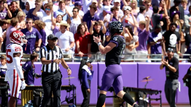 Oct 1, 2022; Fort Worth, Texas, USA; TCU Horned Frogs quarterback Max Duggan (15) reacts after throwing a touchdown pass during the first half against the Oklahoma Sooners at Amon G. Carter Stadium.