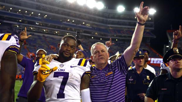 Oct 15, 2022; Gainesville, Florida, USA; LSU Tigers wide receiver Kayshon Boutte (7) and head coach Brian Kelly celebrate after they beat the Florida Gators at Ben Hill Griffin Stadium.