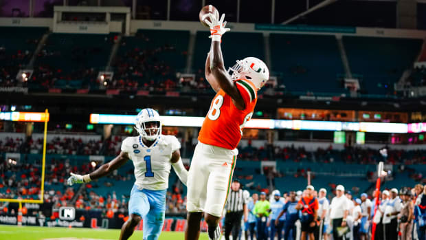 Oct 8, 2022; Miami Gardens, Florida, USA; Miami Hurricanes wide receiver Colbie Young (88) catches a pass to score a touch down against the North Carolina Tar Heels during the second half at Hard Rock Stadium.