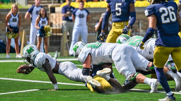 Sep 10, 2022; South Bend, Indiana, USA; Marshall Thundering Herd running back Khalan Laborn (8) dives into the end zone for a touchdown in the second quarter against the Notre Dame Fighting Irish at Notre Dame Stadium.