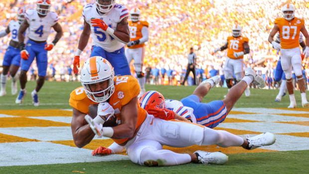 Sep 24, 2022; Knoxville, Tennessee, USA; Tennessee Volunteers wide receiver Bru McCoy (15) catches a pass in the end zone for a touchdown against the Florida Gators during the first half at Neyland Stadium.