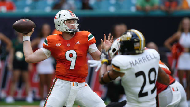 Sep 10, 2022; Miami Gardens, Florida, USA; Miami Hurricanes quarterback Tyler Van Dyke (9) attempts a pass against the Southern Miss Golden Eagles during the first half at Hard Rock Stadium.