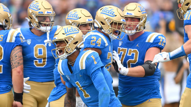 Sep 17, 2022; Pasadena, California, USA; UCLA Bruins quarterback Dorian Thompson-Robinson (1) celebrates with running back Zach Charbonnet (24) in the end zone but the touchdown was reversed after a review of the next play in the first half South Alabama Jaguars at the Rose Bowl.